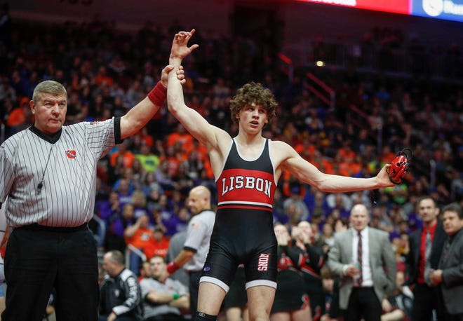 Lisbon senior Cobe Siebrecht celebrates after beating Underwood freshman Nick Hamilton for a Class 1A state championship win at 138 pounds on Saturday, Feb. 16, 2019, at Wells Fargo Arena in Des Moines.