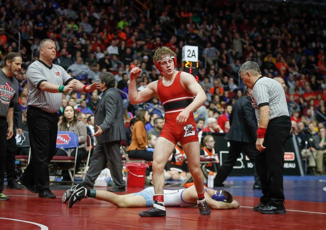 Lisbon junior Cael Happel celebrates after beating Underwood junior Logan James for a Class 1A state title win at 132 pounds during the state wrestling Class 1A championship on Saturday, Feb. 16, 2019, at Wells Fargo Arena in Des Moines.
