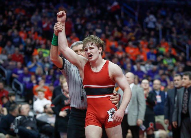 Lisbon junior Cael Happel celebrates after beating Underwood junior Logan James for a Class 1A state title win at 132 pounds during the state wrestling Class 1A championship on Saturday, Feb. 16, 2019, at Wells Fargo Arena in Des Moines.