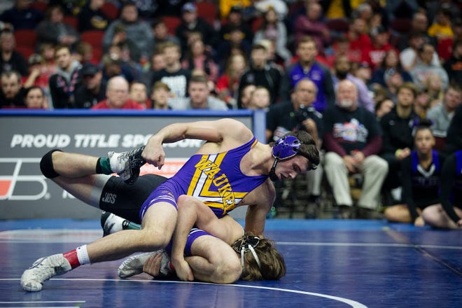 Waukee's Anthony Zach wrestles Ankeny Centennial's Logan Neils during the 170 pound class 3A championship match during the Iowa high school state wrestling tournament on Saturday, Feb. 16, 2019, in Wells Fargo Arena.