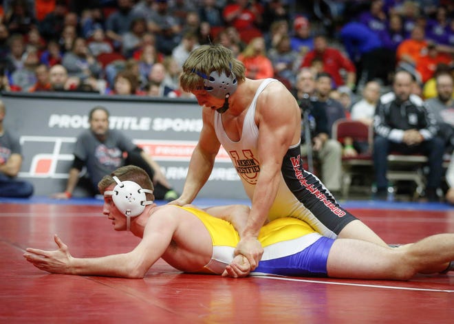 Akron-Westfield senior John Henrich controls Don Bosco freshman Carson Tenold in their match at 160 pounds during the state wrestling Class 1A championship on Saturday, Feb. 16, 2019, at Wells Fargo Arena in Des Moines.