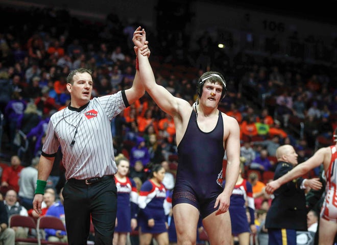 Iowa Valley senior Garet Sims celebrates after beating Alta-Auralia senior Nick Gaes for a Class 1A state title win at 220 pounds on Saturday, Feb. 16, 2019, at Wells Fargo Arena in Des Moines.