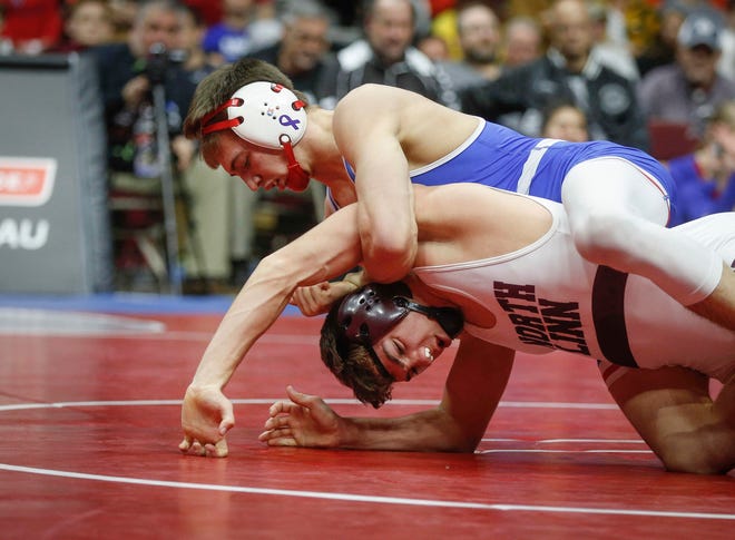 West Sioux senior Kory Van Oort controls North Linn senior Brady Henderson in their match at 152 pounds during the state wrestling Class 1A championship on Saturday, Feb. 16, 2019, at Wells Fargo Arena in Des Moines.