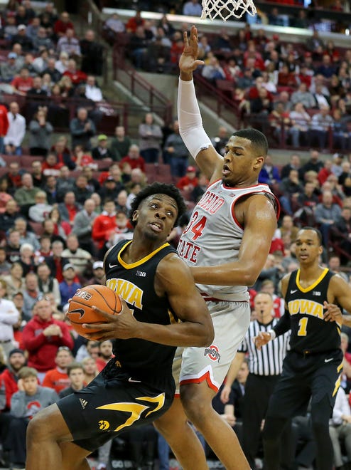 Feb 26, 2019; Columbus, OH, USA; Iowa Hawkeyes forward Tyler Cook (25) past Ohio State Buckeyes forward Kaleb Wesson (34) during the second half at Value City Arena.