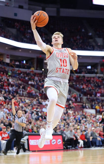 Feb 26, 2019; Columbus, OH, USA; Ohio State Buckeyes forward Justin Ahrens (10) shoots a layup during the first half against the Iowa Hawkeyes at Value City Arena.