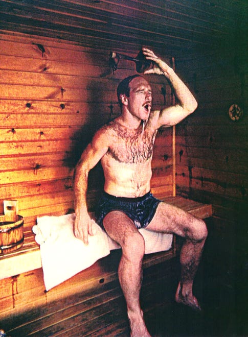 From 1983: Dan Gable cools off in his sauna after a run near his Lansing, Iowa cabin.
