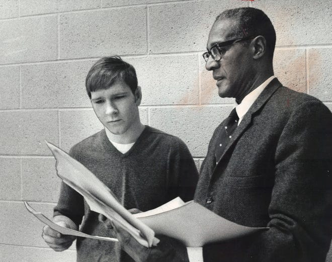 From 1970: Iowa State University student-athlete Dan Gable discusses a lesson with Dr. William Bell, who teaches a course on supervised recreation.