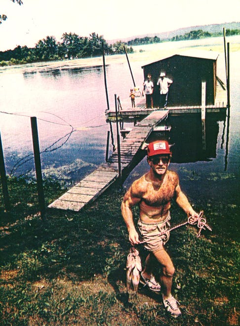 From 1983: Iowa wrestling coach Dan Gable and his haul after a day of fishing on the Mississippi River near his cabin near Lansing, Iowa.