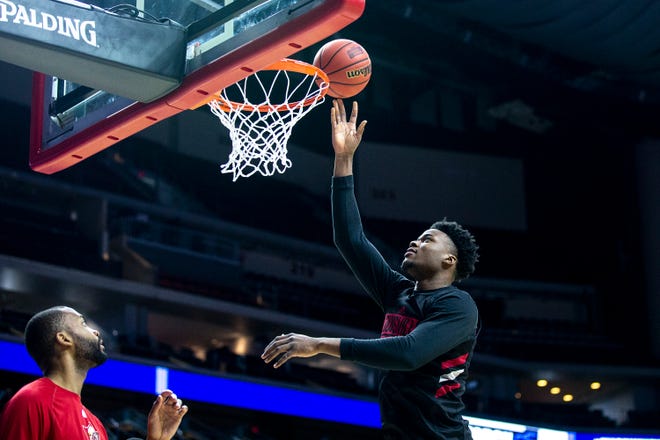 Louisville's Steven Enoch shoot a lay-up during Louisville's open practice before the first round of the NCAA Men's Basketball Tournament on Wednesday, March 20, 2019, at Wells Fargo Arena in Des Moines, Iowa.