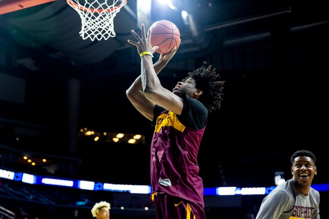 Minnesota's Daniel Oturu shoots a lay-up during Minnesota's open practice before the first round of the NCAA Men's Basketball Tournament on Wednesday, March 20, 2019, at Wells Fargo Arena in Des Moines, Iowa. Minnesota will face Louisville in the first round on Thursday.