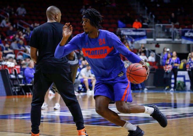 Florida sophomore guard Deaundrae Ballard drives the ball to the net during open practice on Wednesday, March 20, 2019, at Wells Fargo Arena in Des Moines, Iowa.