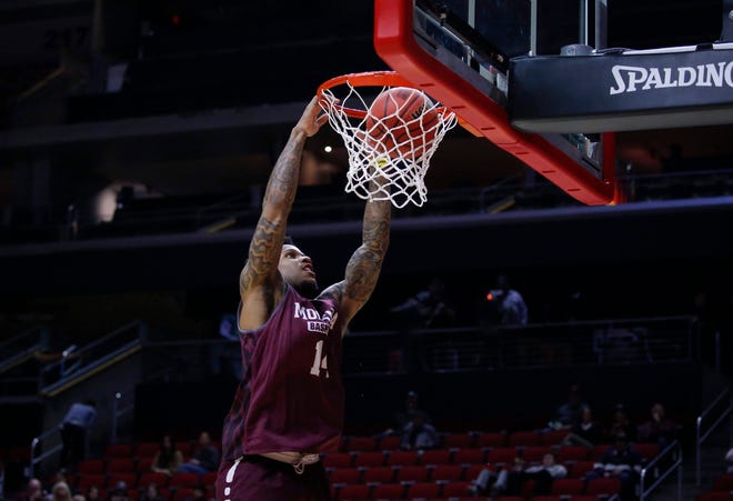 Montana senior Ahmaad Rorie dunks the ball during open practice on Wednesday, March 20, 2019, at Wells Fargo Arena in Des Moines, Iowa.
