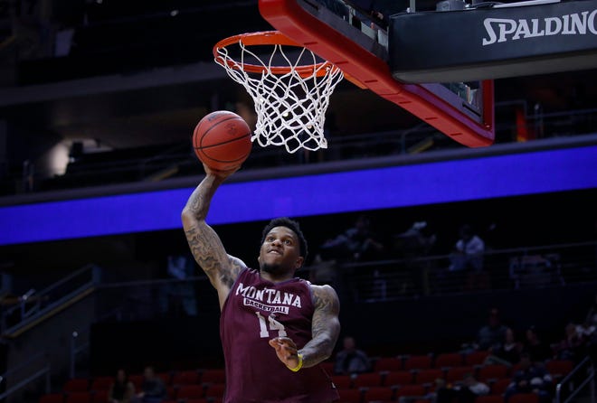 Montana senior Ahmaad Rorie dunks the ball during open practice on Wednesday, March 20, 2019, at Wells Fargo Arena in Des Moines, Iowa.