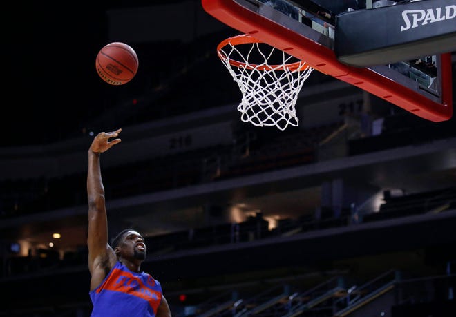 Florida senior Kevarrius Hayes hooks the ball into the basket during open practice on Wednesday, March 20, 2019, at Wells Fargo Arena in Des Moines, Iowa.