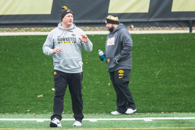 Iowa offensive coordinator Brian Ferentz calls out to players during a Hawkeye football spring practice on Thursday, April 4, 2019, at the University of Iowa outdoor practice facility in Iowa City, Iowa.