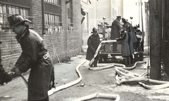 From 1938: Firemen battle a February blaze in downtown Des Moines.