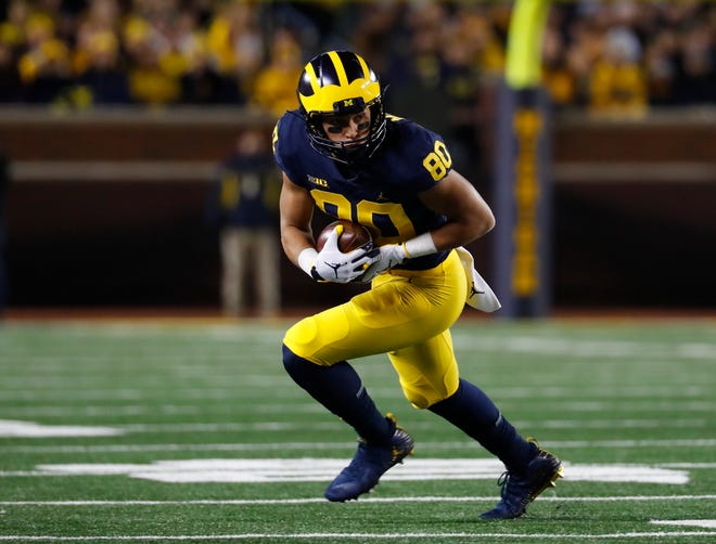 Michigan wide receiver Oliver Martin runs after a catch in the first half against Wisconsin in Ann Arbor, Mich., Saturday, Oct. 13, 2018.