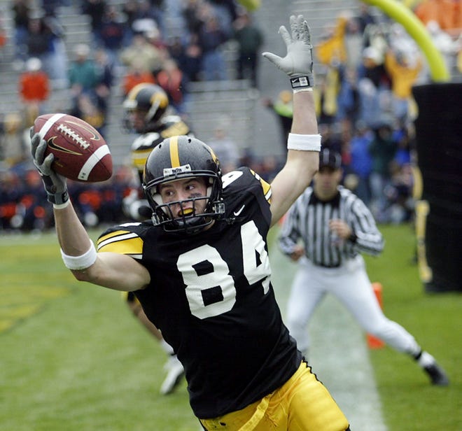 Matt Melloy (2003-2005) celebrates a touchdown catch in the fourth quarter of a Nov. 1, 2003 game against visiting Illinois.