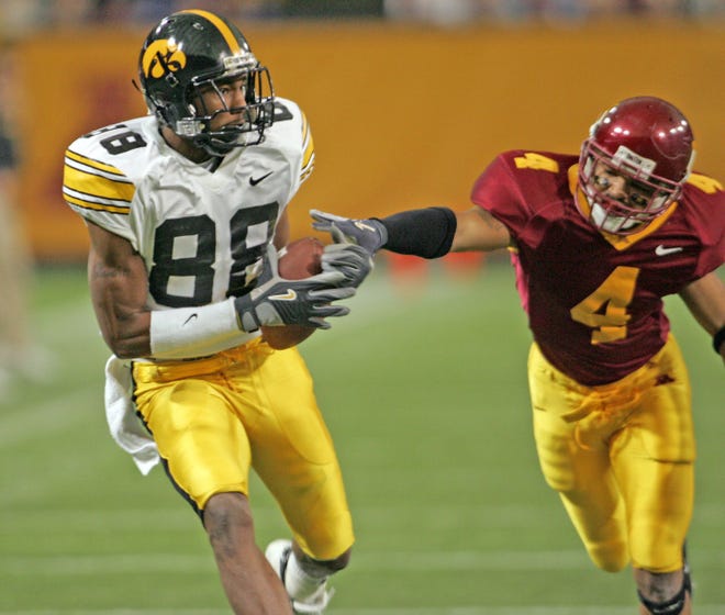 Clinton Solomon (2002, 2004-2005) finished his career in a Hawkeye uniform with 118 receptions for 1,864 yards and 14 touchdowns. Solomon is pictured catching a pass against Minnesota on Nov. 13, 2004.