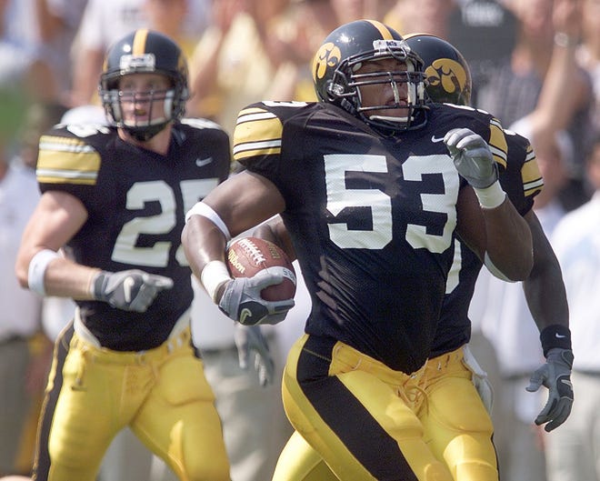 Iowa's Kevin Worthy runs for a defensive touchdown after picking up a fumble against Akron on Aug. 31, 2002 in Iowa City.