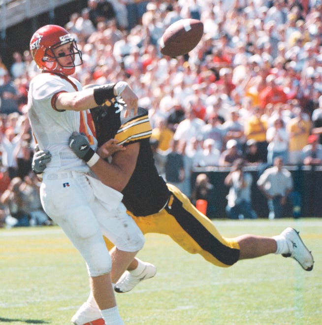 Mike Dolezal smashes into Iowa State quarterback Sage Rosenfels during a game on Sept. 16, 2000 at Kinnick Stadium.