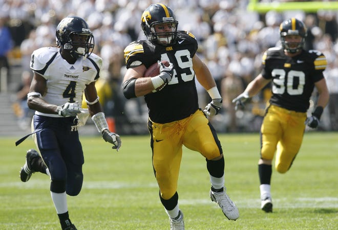 A.J. Edds runs with the ball after intercepting a pass against Florida International in the first quarter of a game played Sept. 6, 2008 at Kinnick Stadium.