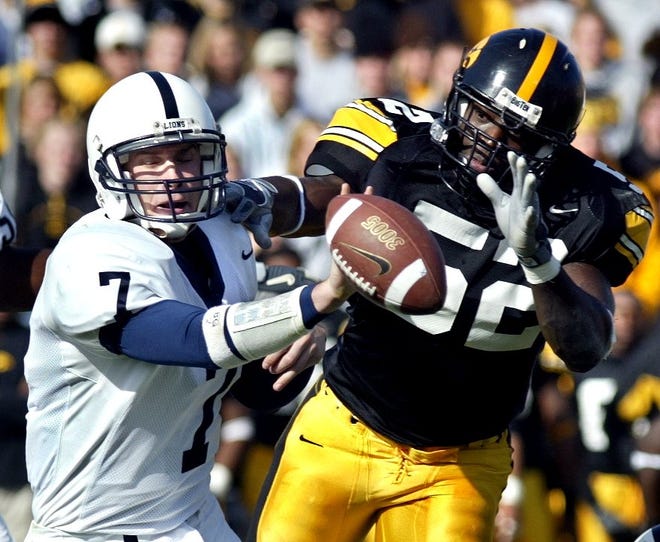 Abdul Hodge makes this lateral by Penn State's Zack Mills a difficult one in a Oct. 25, 2003 game at Kinnick Stadium.