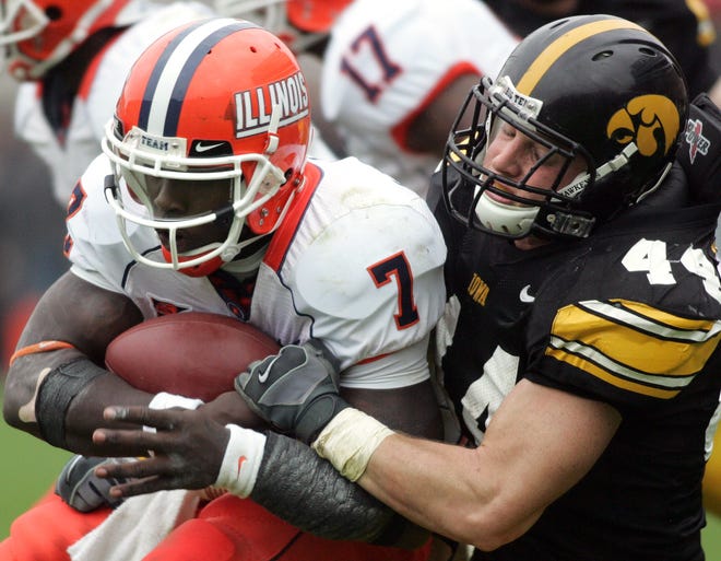 Iowa's Mike Humpal brings down Illinois quarterback Isiah Williams for a loss in the third quarter of a game played Oct. 13, 2008 at Kinnick Stadium. Humpal finished the day with 18 tackles.