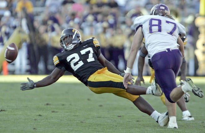 Hawkeye linebacker Edmond Miles reaches for an interception against Northern Iowa during a game played Sept. 17, 2005 at Kinnick Stadium.