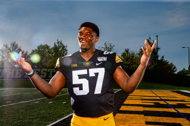 Chauncey Golston stands for a photo during Hawkeye football media day Friday, Aug. 9, 2019.