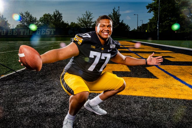 Alaric Jackson stands for a photo during Hawkeye football media day Friday, Aug. 9, 2019.