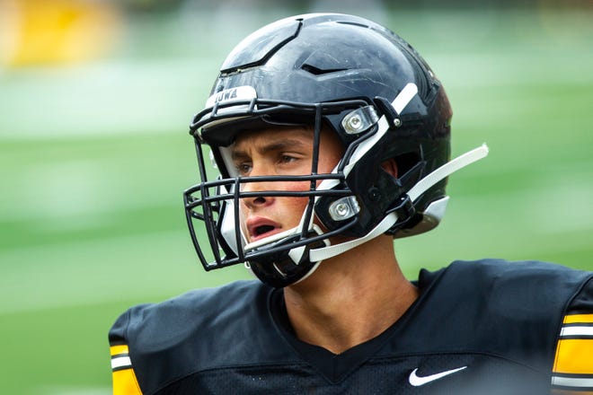 Iowa wide receiver Oliver Martin (5) stands on the sideline while running a drill during a Hawkeyes football Kids Day scrimmage, Saturday, Aug. 10, 2019, at Kinnick Stadium in Iowa City, Iowa.