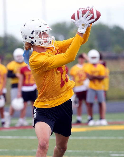 Ankeny wide receiver Brody Brecht catches a pass during practice Monday, Aug. 12, 2019.