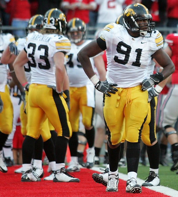 Iowa defensive end Broderick Binns, right, reacts after an Ohio State touchdown during the second quarter of their game Saturday, Nov. 14, 2009, in Columbus, Ohio. Ohio State won the game 27-24 in overtime.