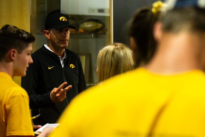 Josh Berka, associate director of event management at the University of Iowa athletics department, talks while University of Iowa freshman students from the class of 2023 get a behind the scenes tour, Friday, Aug. 23, 2019, at Kinnick Stadium in Iowa City, Iowa.