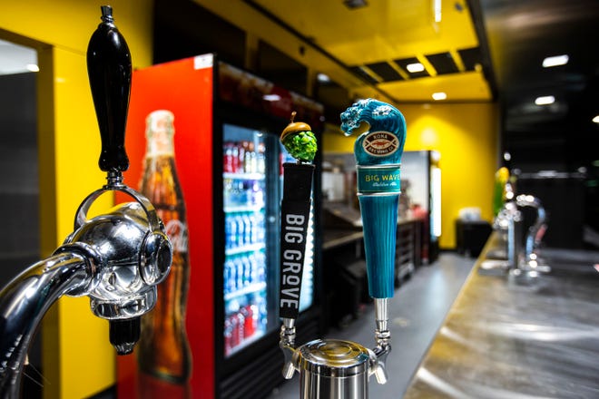 Big Grove Brewery and Kona Brewing Company taps are pictured during a behind the scenes tour, Friday, Aug. 23, 2019, at Kinnick Stadium in Iowa City, Iowa.