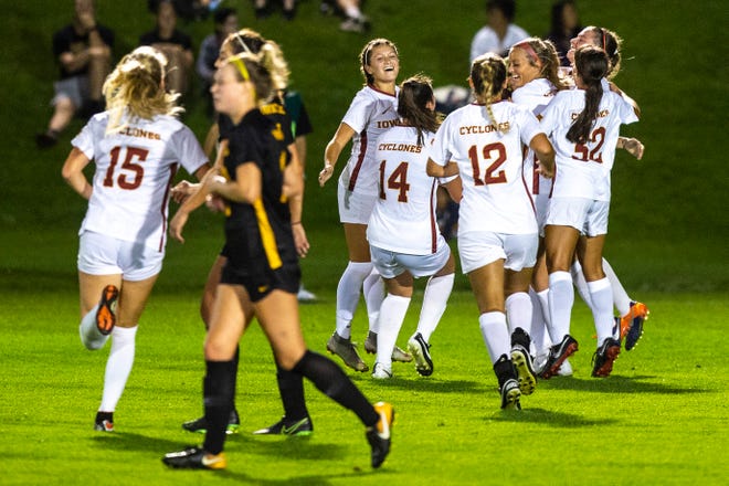 Iowa State forward Abbey Van Wyngarden (23) gets embraced by teammates after scoring a goal during a NCAA women's soccer Cy-Hawk series game, Thursday, Aug. 29, 2019, at the University of Iowa Soccer Complex in Iowa City, Iowa.