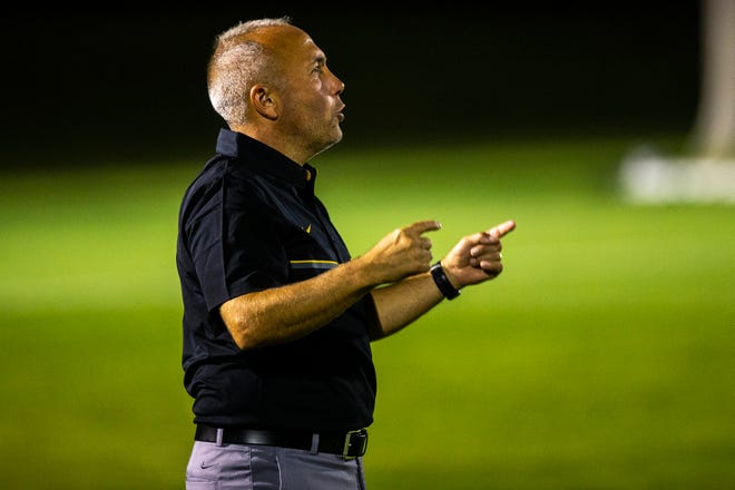 Iowa soccer head coach Dave DiIanni calls out to players during a NCAA women's soccer Cy-Hawk series game, Thursday, Aug. 29, 2019, at the University of Iowa Soccer Complex in Iowa City, Iowa.