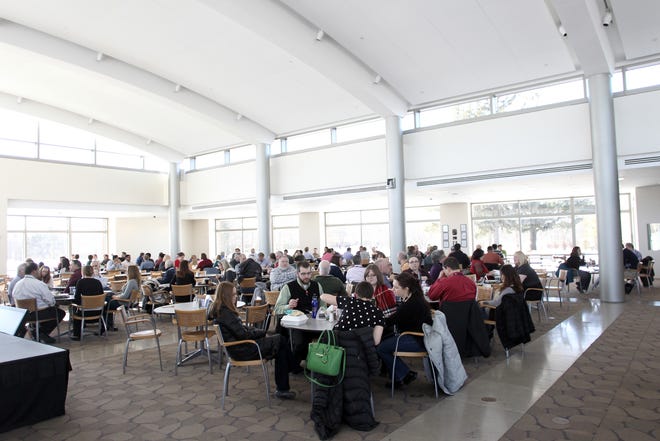 Employees gather for lunch at the ACT campus on Wednesday, April 26, 2014.