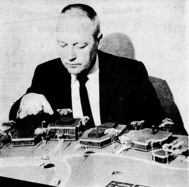 From 1966: Robert N. Donaldson, director of publications and public information services for the American College Testing Program, points to the executive offices building in a model of ACT's project national headquarters center. The independent, non-profit corporation plans to build its headquarters cluster between Highway 1 and the Old Solon Road, near Interstate 80. Other buildings in the million-dollar center (from left) are planned for research and development, operations and service functions.
