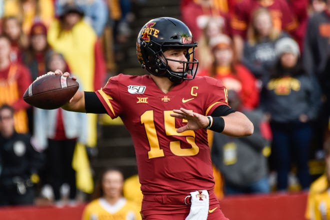 Oct 26, 2019; Ames, IA, USA; Iowa State Cyclones quarterback Brock Purdy (15) throws a pass against the Oklahoma State Cowboys during the first quarter at Jack Trice Stadium.