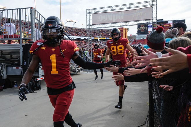 Oct 26, 2019; Ames, IA, USA; Iowa State Cyclones wide receiver Tarique Milton (1) greets fans as he runs off the field before the game against the Oklahoma State Cowboys at Jack Trice Stadium.