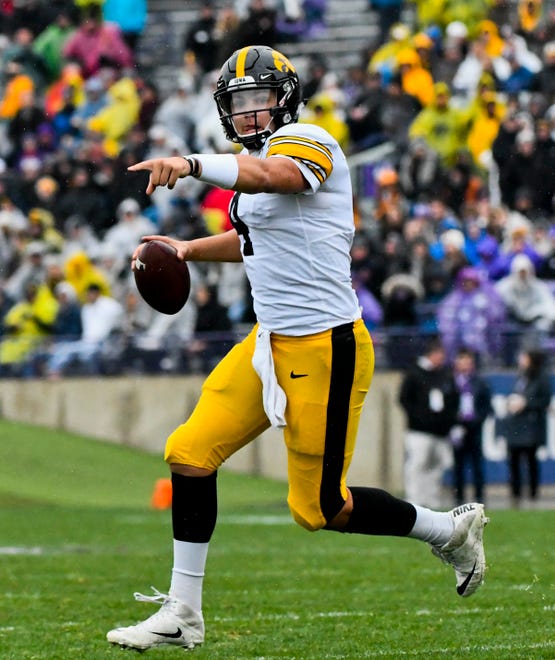 Oct 26, 2019; Evanston, IL, USA; Iowa Hawkeyes quarterback Nate Stanley (4) looks to pass into the end zone against the Northwestern Wildcats during the second half at Ryan Field. Mandatory Credit: Matt Marton-USA TODAY Sports