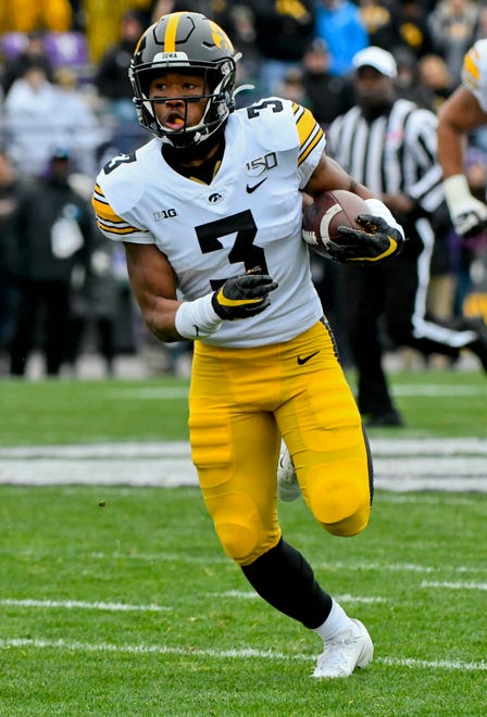 Oct 26, 2019; Evanston, IL, USA; Iowa Hawkeyes wide receiver Tyrone Tracy Jr. (3) runs for a touchdown against Northwestern Wildcats in the first half at Ryan Field. Mandatory Credit: Matt Marton-USA TODAY Sports
