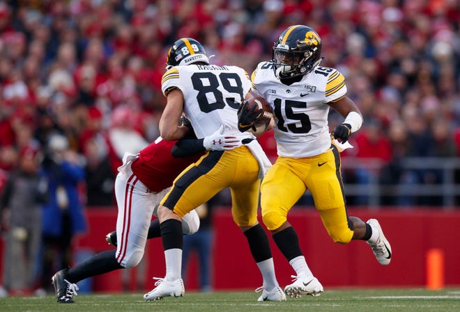 Nov 9, 2019; Madison, WI, USA; Iowa Hawkeyes running back Tyler Goodson (15) runs the ball during the second quarter against the Wisconsin Badgers at Camp Randall Stadium.