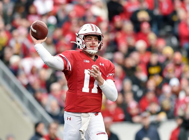 MADISON, WISCONSIN - NOVEMBER 09: Jack Coan #17 of the Wisconsin Badgers passes in the first half against the Iowa Hawkeyes at Camp Randall Stadium on November 09, 2019 in Madison, Wisconsin. (Photo by Quinn Harris/Getty Images)