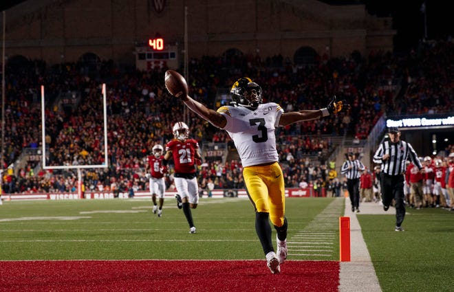 Nov 9, 2019; Madison, WI, USA; Iowa Hawkeyes wide receiver Tyrone Tracy Jr. (3) rushes for a touchdown after catching a pass during the fourth quarter against the Wisconsin Badgers at Camp Randall Stadium. Mandatory Credit: Jeff Hanisch-USA TODAY Sports