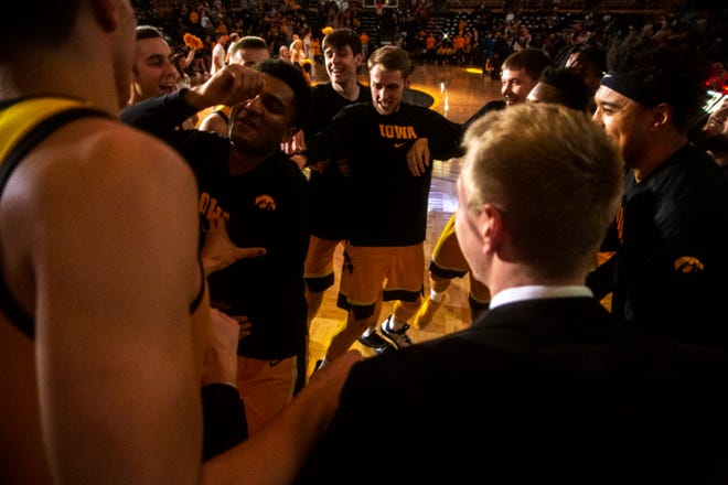 Iowa guard Nicolas Hobbs huddle up with teammates before a NCAA non-conference men's basketball game, Monday, Nov., 11, 2019, at Carver-Hawkeye Arena in Iowa City, Iowa.