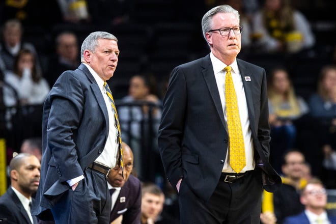 Iowa assistant coach Kirk Speraw and Iowa head coach Fran McCaffery stand at the bench during a NCAA non-conference men's basketball game, Monday, Nov., 11, 2019, at Carver-Hawkeye Arena in Iowa City, Iowa.