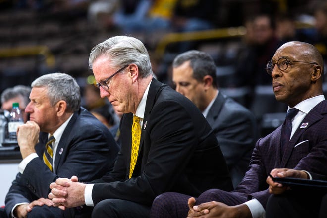 Iowa assistant coach Kirk Speraw, from left, head coach Fran McCaffery and assistant coach Sherman Dillard  during a NCAA non-conference men's basketball game, Monday, Nov., 11, 2019, at Carver-Hawkeye Arena in Iowa City, Iowa.